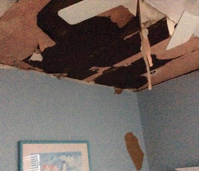 Ceiling with insulation and sheetrock falling
