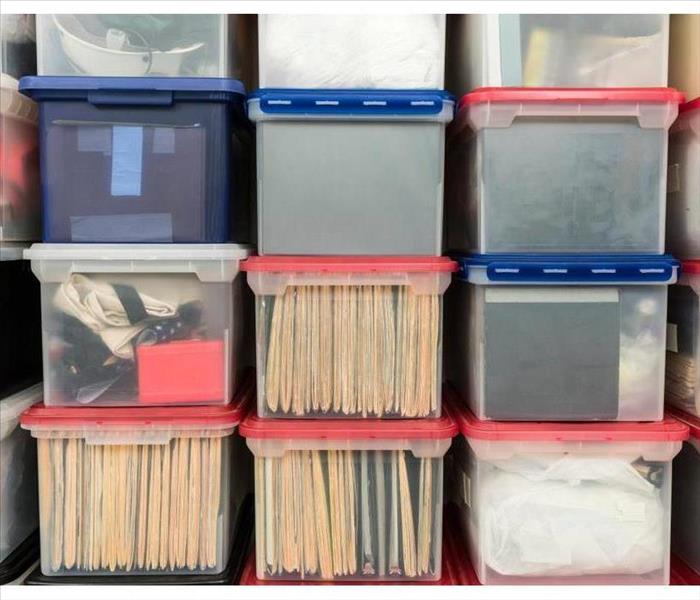Documents in plastic containers